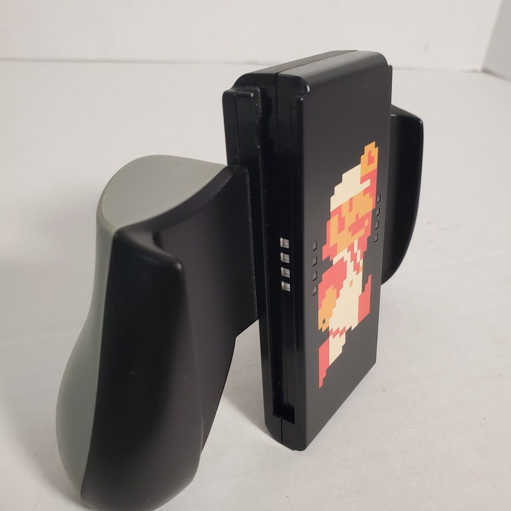 PowerA Nintendo Switch Joy-Con‎ Comfort Grip Super Mario Pixel Fire Mario 2017 - Picture 2 of 14